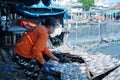 May 13, 2023. The preparation to dry the salted fish on a bamboo tray in Gresik, Indonesia.