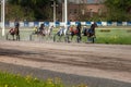 May 16, 2021, Russia, Central Moscow Racetrack. Races of horses trotters with a carriage. Long exposure effect