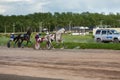 May 16, 2021, Russia, Moscow. Central racecourse. Trials of trotters drawn into a carriage with a rider. Race leaders,