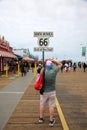 May 14, 2021 Santa Monica California, USA: End of Route 66 Sign on the Santa Monica Pier. Highway Sign that reads the End of the Royalty Free Stock Photo