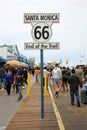 May 14, 2021 Santa Monica California, USA: End of Route 66 Sign on the Santa Monica Pier. Highway Sign that reads the End of the Royalty Free Stock Photo