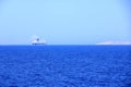 May 27 2023 - Santa Teresa Gallura, Sardinia, Italy, Mediterranean sea: Large Grimaldi Lines RoRo (Roll on off) vessel