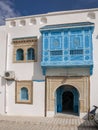 27 May 2011. Sidi Bou Said, Tunisia. Typical Tunisian house frontage showing door, balcony and windows.