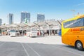 yellow buse of Regiojet company at the boarding of passengers at the bus station of Bratislava