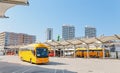yellow buse of Regiojet company at the boarding of passengers at the bus station of Bratislava
