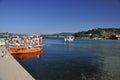 May 10, 2013 - Small bright fishing boats stand in the greek seaport Royalty Free Stock Photo