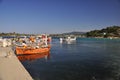 May 10, 2013 - Small bright fishing boats stand in the greek seaport Royalty Free Stock Photo