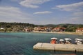 May 10, 2013 - Small bright fishing boats stand in the greek seaport Royalty Free Stock Photo