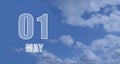 May 01. 01th day of the month, calendar date. White numbers against a blue sky with clouds. Copy space, Spring month, day of the