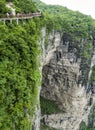 28 May 2018: Tourists walking at The Cliff Hanging Walkway at Tianmen Mountain, The Heaven`s Gate at Zhangjiagie, Hunan Province