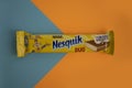 May 6, 2023 Ukraine city Kyiv Nesquik chocolate from Nestle consume on a colored background