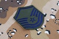 May 12, 2018. US AIR FORCE Master Sergeant rank patch on desert camouflage uniform background