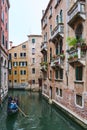 Gondola ride on canal in Venice