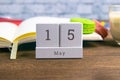 May 15 on the wooden calendar.The fifteenth day of the spring month, a calendar for the workplace. Spring