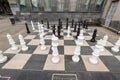 Large chess pieces on a city street allow everyone to play a game