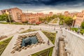 Scenic view from the stairs of Cascade monument to the colorful sunset over roofs of Yerevan city