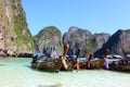 Maya bay with long tail boats parked in white sand