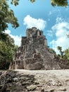 A maya temple in the middle of the mexican jungle