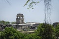 Maya temple ruins with palace and observation tower surrounded by ivy, Palanque, Chiapas, Mexico Royalty Free Stock Photo