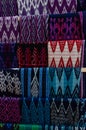 Mayan blankets textile designs on the market in Guatemala with indigenous and traditional bright colors