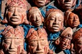 Mayan clay face masks on a market, Antigua Guatemala