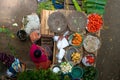 The Mayan woman is waiting to sell her vegetable in the market of Zunil Guatemala.