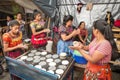 Mayan women preparing food at the martket of Chichicastenango