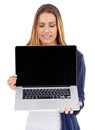 Maybe I should give this technology thing a go. A young woman holding a laptop - isolated.