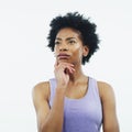 Maybe I should think this one through. Studio shot of an attractive young woman looking up and feeling thoughtful