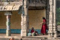 Two Indian women inside an ancient temple Royalty Free Stock Photo