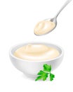 Mayonnaise in a bowl and spoon