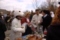 The mayor of ÃÅisovice in traditional costume in the company the rabbit masks