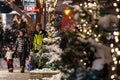 MAYRHOFEN, AUSTRIA - JANUARY 17 2013: People strolling through Mayrhofen in the evening Royalty Free Stock Photo