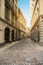 Riga, Latvia. Maza Smilsu iela street in Riga. Narrow medieval cobbled street in the old town in Riga. Royalty Free Stock Photo