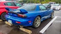 Shizuoka Japan September 8 2018 blue Mazda RX-7 on a wet parking lot