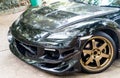 A Mazda RX8 is wearing Volk Rays TE37 Golden 18 inches Rim.