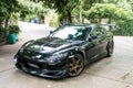 A Mazda RX8 is wearing Volk Rays TE37 Golden 18 inches Rim.