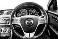 Mazda steering wheel - Car dashboard dials - engine RPM and speedometer Royalty Free Stock Photo