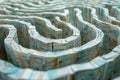 A maze constructed out of currency notes rests on top of a table, creating an intriguing and puzzling scene, Labyrinth made of Royalty Free Stock Photo