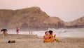 Couple chilling out during sunset at Mermejita beach