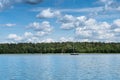 Mazury Lakes view with sailing boat at midday