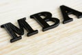 MBA sign on wood background