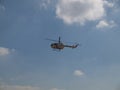 Mbb bolkow blohm helicopter of the coast guard performing stunts during the philippine hot air balloon festival in clark pampanga