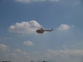 Mbb bolkow blohm helicopter of the coast guard performing stunts during the philippine hot air balloon festival in clark pampanga