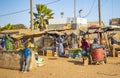 MBour, Senegal, AFRICA - April 22, 2019: Street fruit market where locals sell tropical fruits like melons, mangoes, oranges,