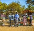 MBour, Senegal, AFRICA - April 22, 2019: Street fruit market where locals sell tropical fruits like melons, mangoes, oranges,