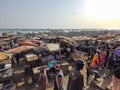 MBour, Senegal- April 25 2019: Unidentified Senegalese men and women at the fish market in the port city near Dakar. There are