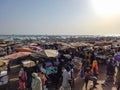 MBour, Senegal- April 25 2019: Unidentified Senegalese men and women at the fish market in the port city near Dakar. There are