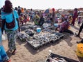 MBour, Senegal- April 25 2019: Unidentified Senegalese men and women at the fish market in the port city near Dakar. There are