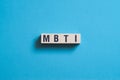 MBTI - Myers-Briggs Type Indicator,word concept on cubes